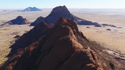 Aerial sweep over Spitzkoppe domes and spires in Namibia desert Stock Footage 341422738