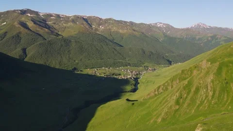 Aerial sweep over Ushguli Svan towers in Upper Svaneti, Georgia Stock Footage 327610094