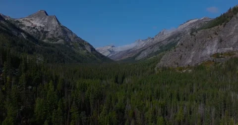 Aerial Sweep Pullback Across Blodgett Canyon Montana and Mountain Ridges Stock Footage 331922474