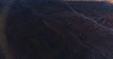 Aerial sweeping view of shadows over Monument Valley Stock Footage 95606980