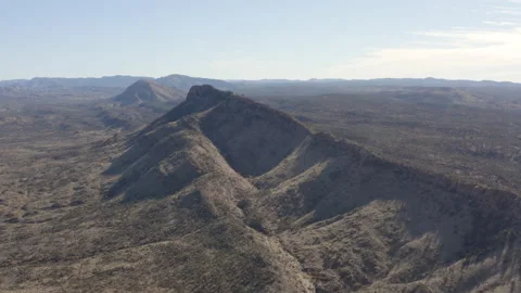 Aerial, sweeping view of a sharp, rocky  ridgeline Stock Footage 190955872