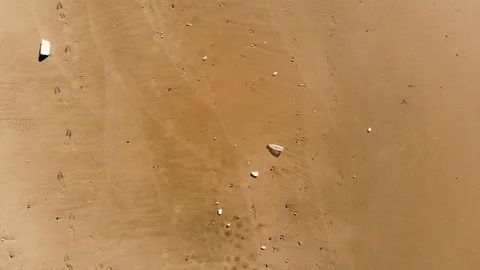 Aerial take of view,fly above Plastic polluted sea shore,wave motion,cilento Stock Footage 122250434