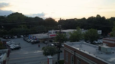 Aerial Takeoff from Little Five Points to reveal Downtown Atlanta Stock Footage 114591939