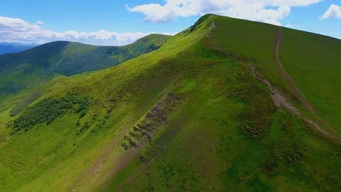 Aerial of three mountain tops of triangular and spiky forms in the Carpathians Stock Footage 93656895