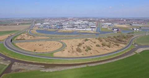 Aerial: Threeway interchange and highways near Goes, the Netherlands. Stock Footage 105210306