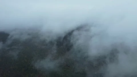 Aerial Through Clouds Over Mountain 動画素材 167190814