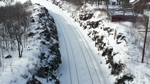 Aerial through train tracks winter in the north Stock Footage 145085147