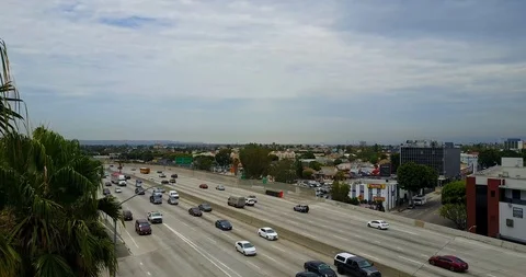 Aerial thruough tree to freeway Stock Footage 114031934