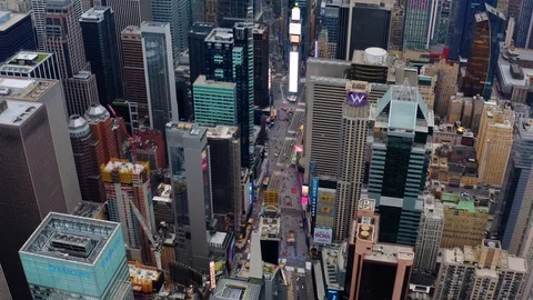 Aerial, tilt up, drone shot overlooking the times square, empire state Stock Footage