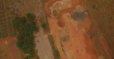 Aerial tilt up over fields in Palermo Stock Footage 76891523