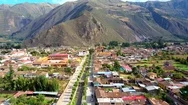 Aerial Tilt Reveal Shot Of City And Mountains. In Latin America - Peru Stock Footage