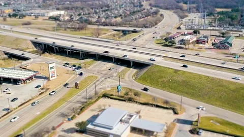 Aerial Tilt Shift Miniature Hyper Lapse Highway Intersection Stock Footage 228876323