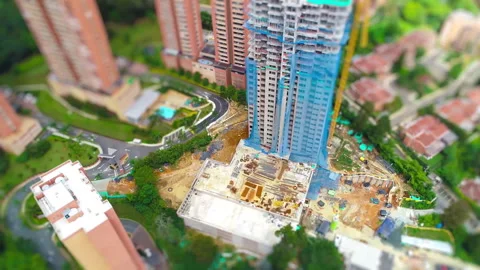 Aerial Tilt Shift take of building construction site Stock Footage 264075099