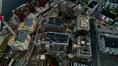 Aerial tilt up shot of new developing Project with building lot in Stock Footage 233948878