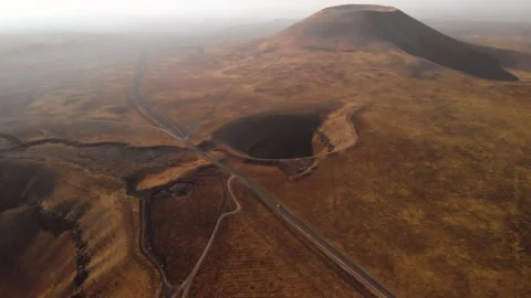 Aerial tilt up shot of road on planet Mars Stock Footage
