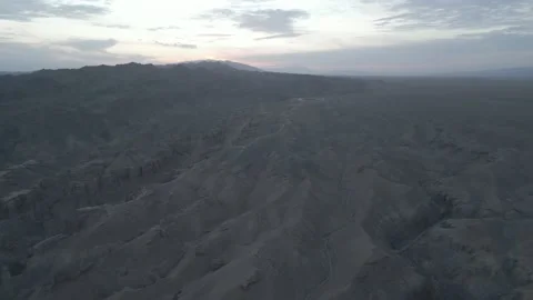 Aerial with a tilt: sunset in the mountains of Charyn Canyon Stock Footage 237335341