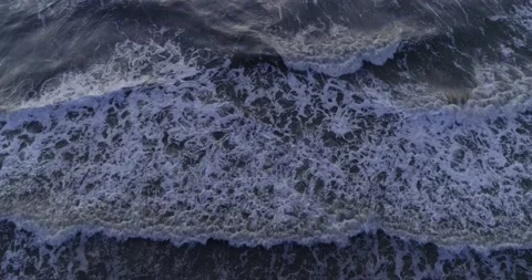 Aerial Tilt to sunset over empty sea at coast Stockbeeldmateriaal 232029453