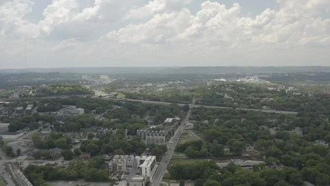 Aerial tilts down over an interstate connection and apartments in Nashville Vidéo 111746788