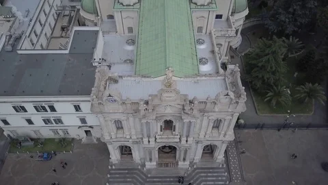 Aerial Tilts down toThe Ground To Reveal The Facade Of  Sanctuary of Pompei Stock Footage 84019610
