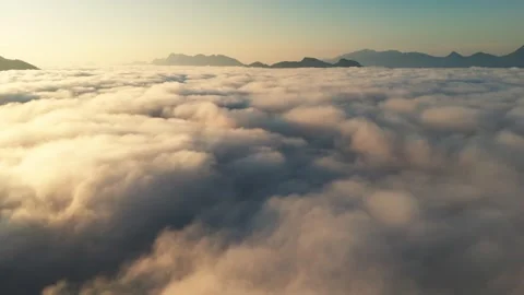 Aerial time lapse above the clouds while sunrise sky Stock Footage 293530936