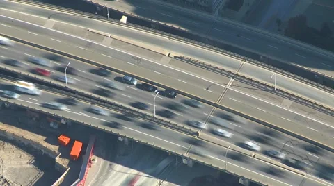 Aerial time-lapse, afternoon rush hour freeway congestion, unique perspective Stock Footage