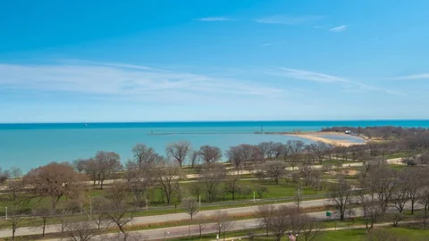 Aerial Time-Lapse of Chicago Beach, Nature, and Skyline Day Stock Footage