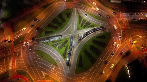 Aerial time lapse of city intersection at night with dynamic traffic flow Stock Footage 321499281