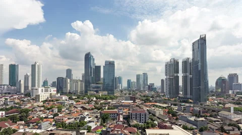 Aerial Time lapse of clouds above Jakarta business district in Indonesia. Stock Footage 68901232