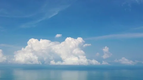 Aerial time lapse of clouds forming over ocean Stock Footage 118999306