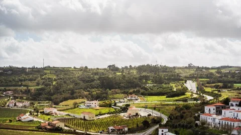 Aerial time-lapse of clouds moving above town of obidos, Leiria District Video stock 114851508