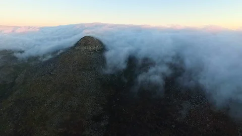 Aerial Time Lapse of Cloudy Peak Engulfed in Clouds Stock Footage 92034928