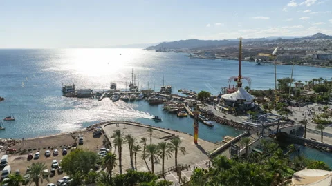 Aerial Time lapse of eilat boardwalk in front of the red sea, Eilat, Israel Stock Footage 220105528