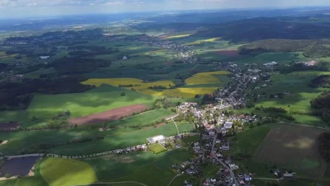 Aerial Time lapse, fast moving cloud shadows, rural environment, village, pond 스톡 동영상 139315273