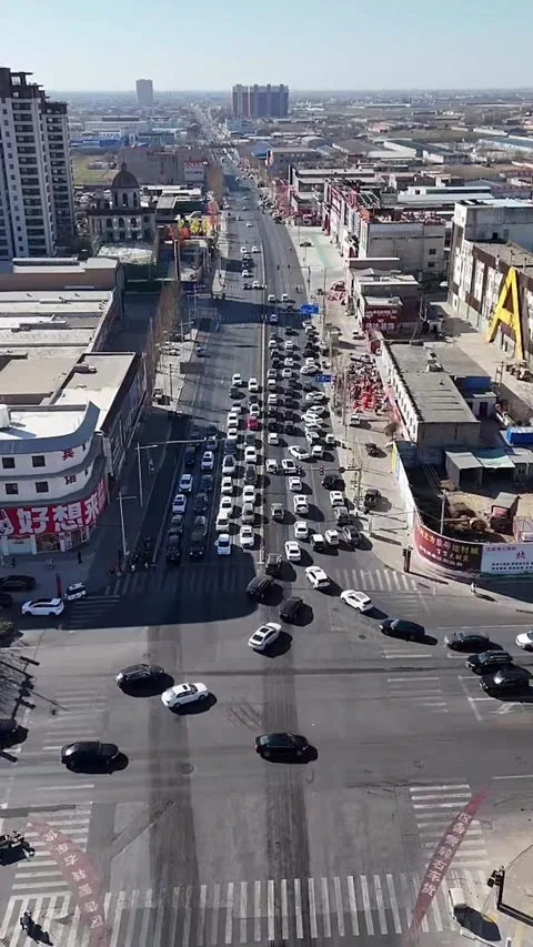 Aerial Time-lapse of Fast Moving Traffic on Urban Main Road Stock Footage 330143285