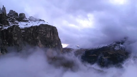 Aerial time lapse flight through mountain range in Dolomites, Italy. Free Stock Footage 98306660