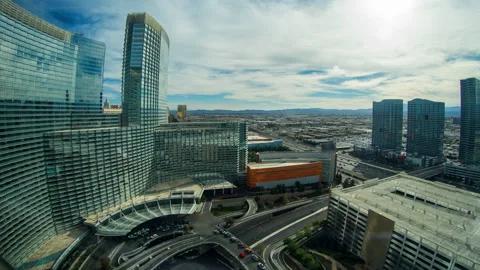 Aerial Time Lapse Lockdown Shot Of Modern Buildings In City Under Cloudy Sky - Stock Footage 206320094