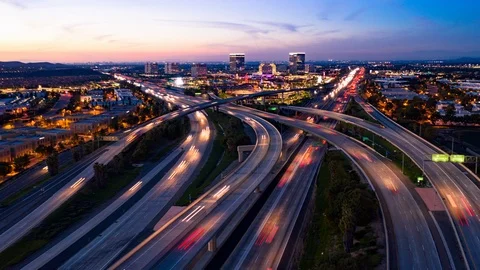 Aerial time lapse in motion drone shot of freeway traffic at night Stock Footage 99531879