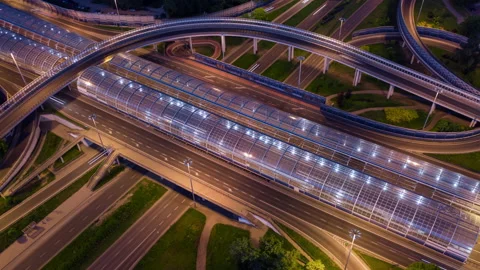 Aerial time lapse multiple road junction, city highway, cars driving freeway Stock Footage 199597790