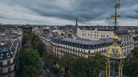 Aerial time lapse in the rain of view up Rue Tronchet towards the Stock Footage 120905699