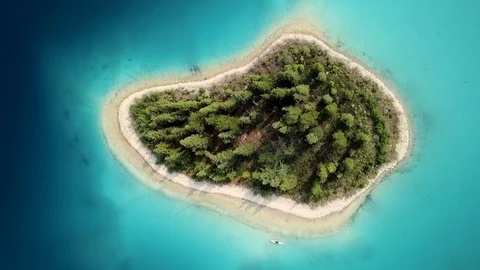 Aerial Time Lapse: Rowing Around the Small Island in a Kayak Stock Footage 97483227
