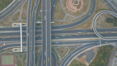Aerial time lapse shot of elevated road intersection shot from above Stock Footage 73787897