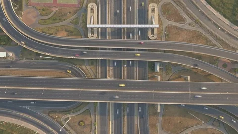 Aerial time lapse shot of elevated road intersection shot from above Stock Footage 73790548