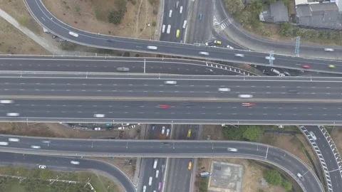 Aerial time lapse shot of elevated road intersection Видео 73795328