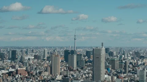 Aerial time lapse of  Skytree tower with Tokyo city in background Stock Footage 125680526