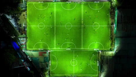 Aerial time lapse of soccer fields during match at night Stock Footage 261362255