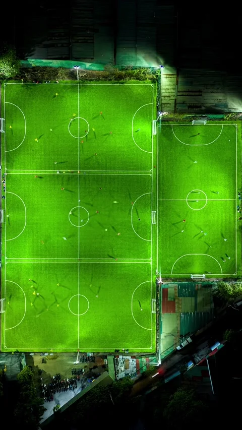 Aerial time lapse of soccer fields during match at night Stock Footage 261362262