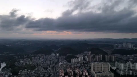 Aerial Time Lapse of Sunset with Dark Storm Clouds Moving Across Sky 스톡 동영상 319879299