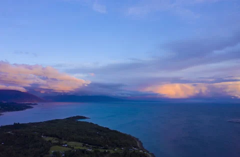 Aerial time lapse at sunset with ocean view and cloud formations Stock Footage 133535889