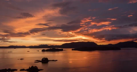 Aerial time lapse of sunset over ocean and islands Stock-Footage 165258583