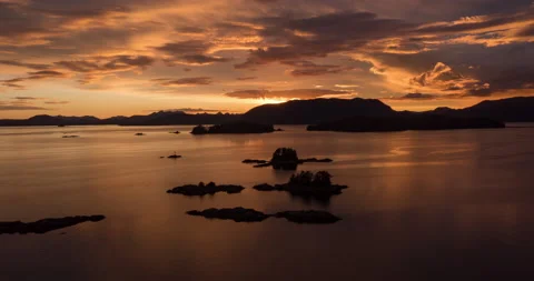 Aerial time lapse of sunset over ocean and islands Stock-Footage 165258848